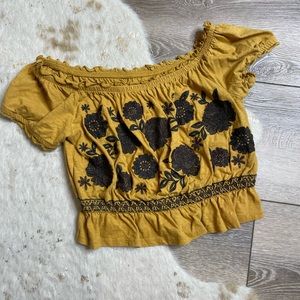 American Eagle mustard yellow floral embroidered ruffle crop top